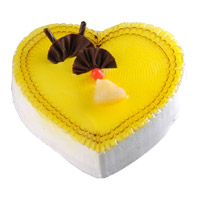 Order Cake Online India Midnight Delivery that includes 3 Kg Heart Shape Pineapple Cake